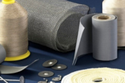 Multiple insulation accessories, including pins, threads, tape, and more on a blue background